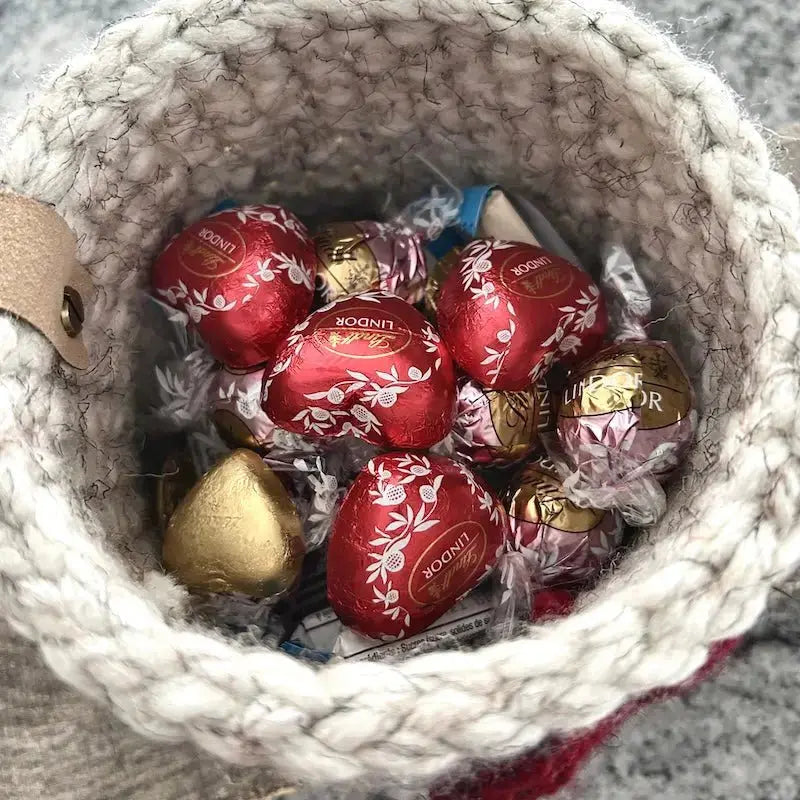 A look at the inside of the heart basket filled with chocolate.