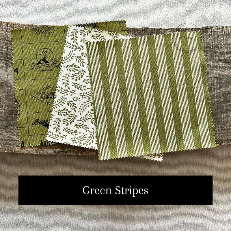 Fabric options for this sewing kit featuring green and white colours.