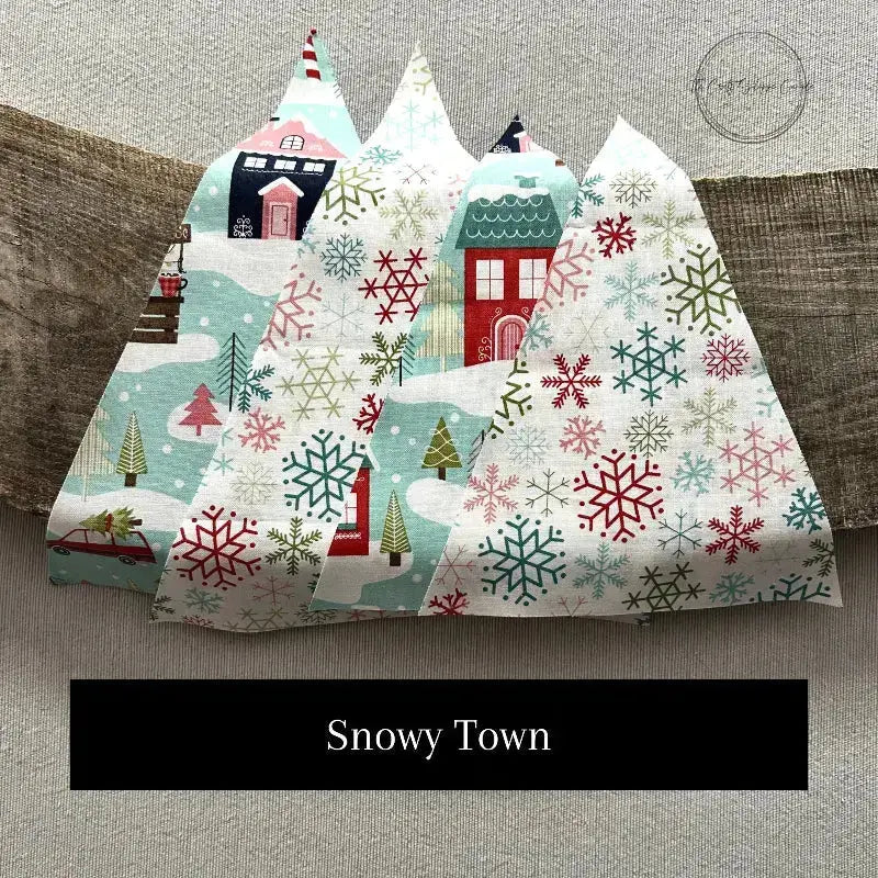 Fabric options for this sewing kit features a snowflake fabric of white and blue.