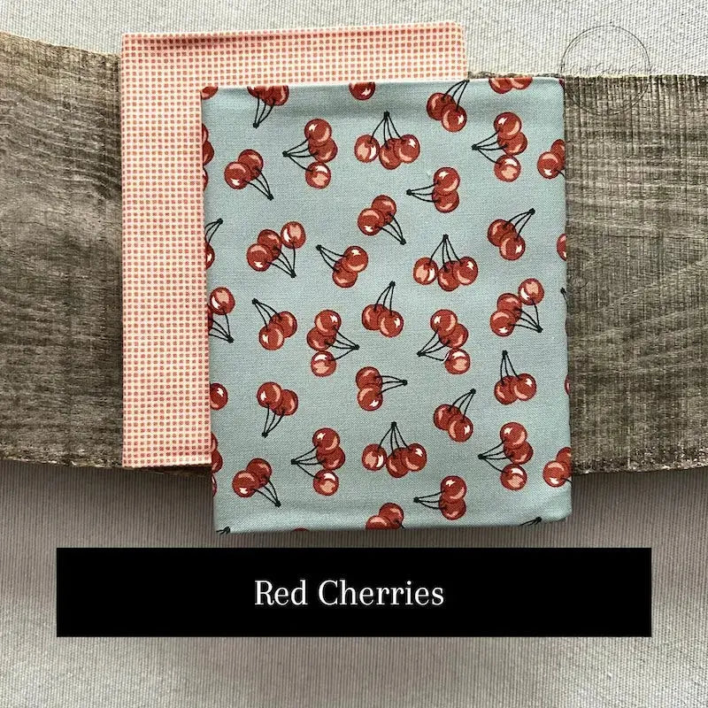 Fabric options for this sewing kit featuring red and blue colours.