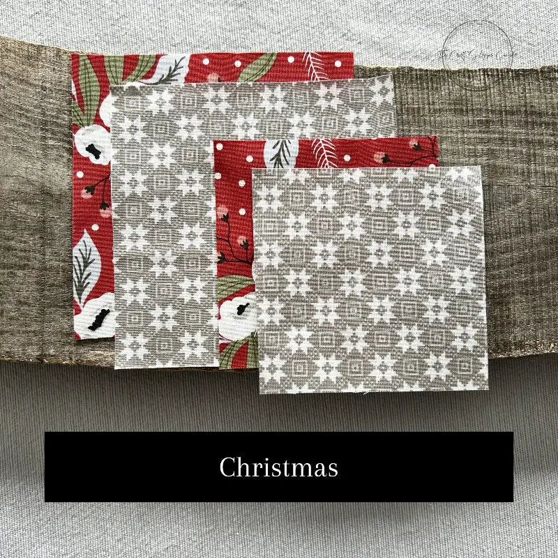 Fabric options for this sewing kit featuring a Christmas pattern of red and grey colours.
