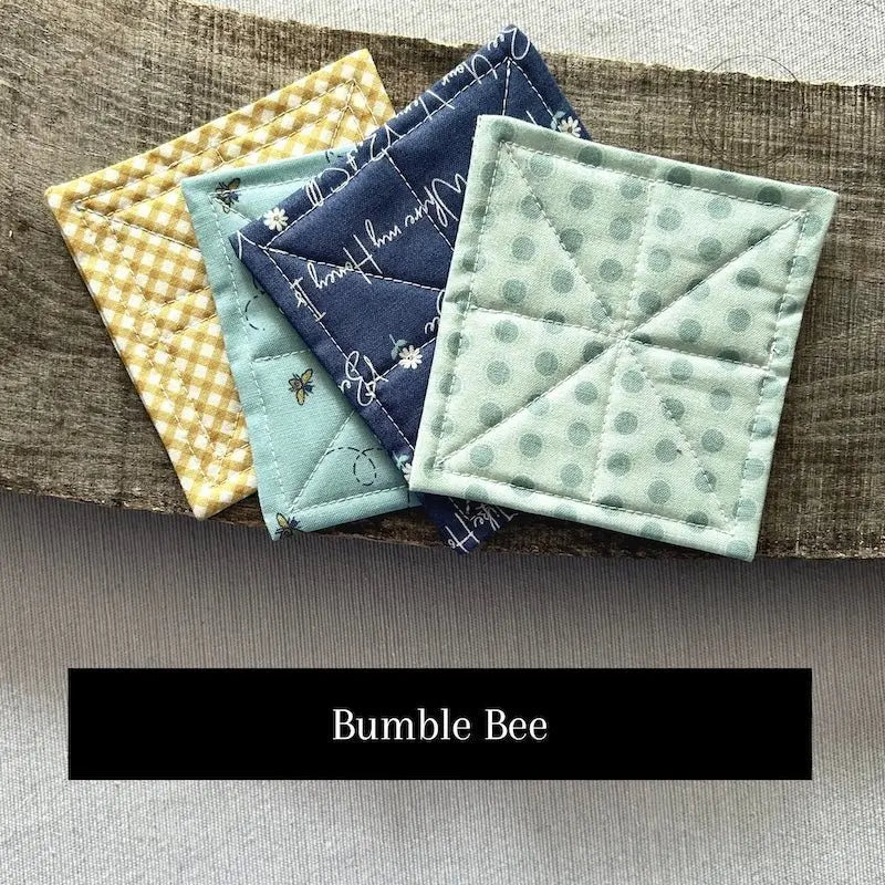 Fabric options for this sewing kit featuring a bumble bee pattern of blues and yellow colours.