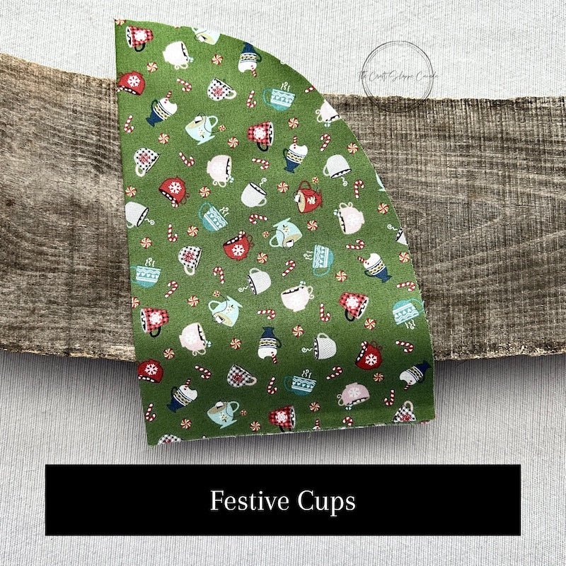 Fabric options for this DIY sewing kit featuring a Christmas coffee cup pattern of green and red colours - The Craft Shoppe Canada