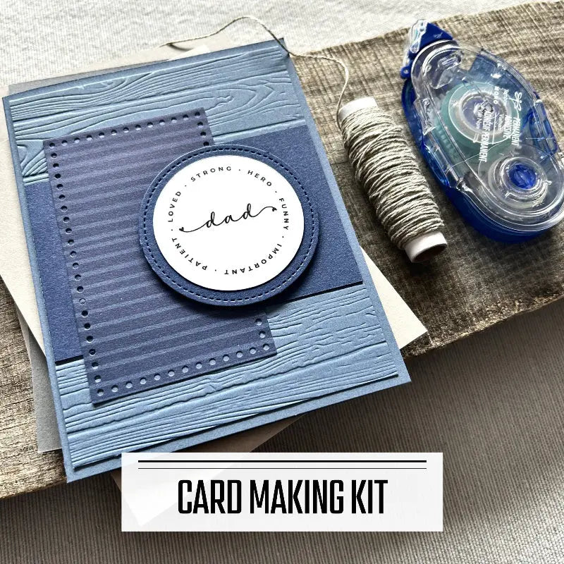 A DIY card making kit for Mother's Day and Father's Day cards. A finished card is sitting on blank cards with a roll of twine and a tape runner. 
