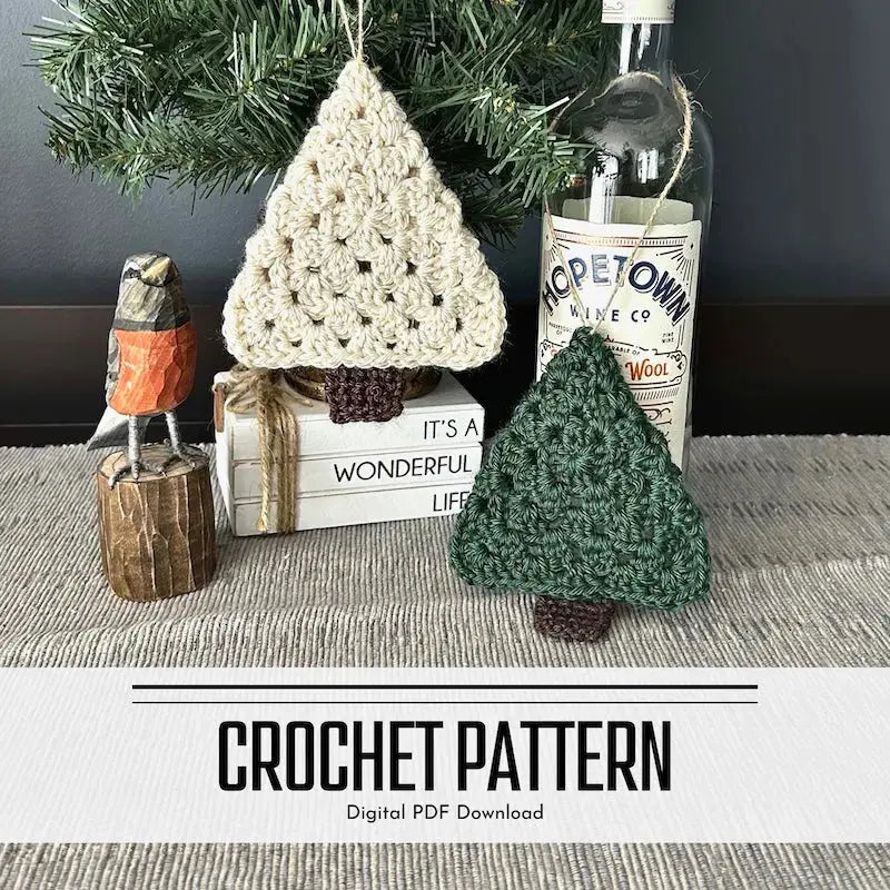 A DIY crochet pattern for Christmas tree Ornaments. The ornaments are hanging on Christmas tree, on a buffet, with a spring bird beside it.