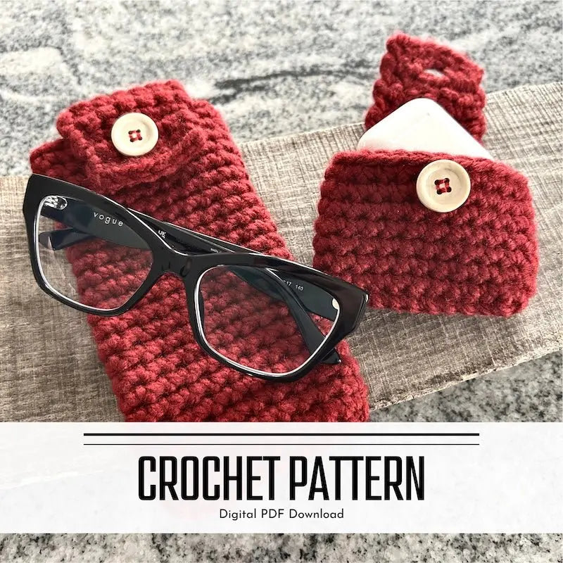 A digital PDF crochet pattern for ear buds and eyeglass accessory cases. The finished cases are sitting on a wooden board glasses and ear buds.