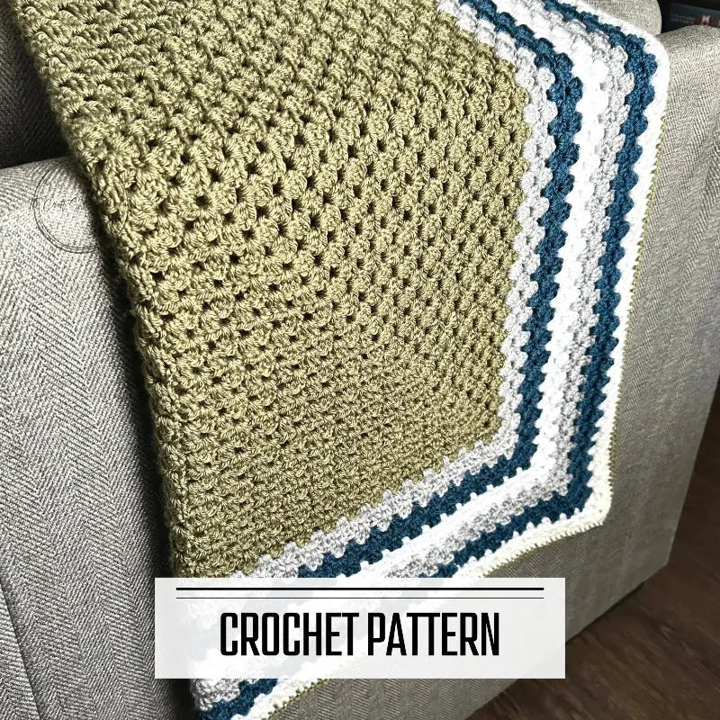 A digital PDF crochet pattern for a couch throw blanket. The finished blanket is hanging over a couch.