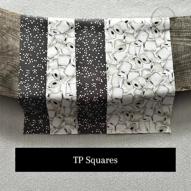 Fabric options for this sewing kit featuring a toilet paper pattern of light and dark grey colours.