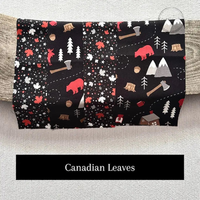 Fabric options for this sewing kit featuring a Canadian theme of black and red colours.