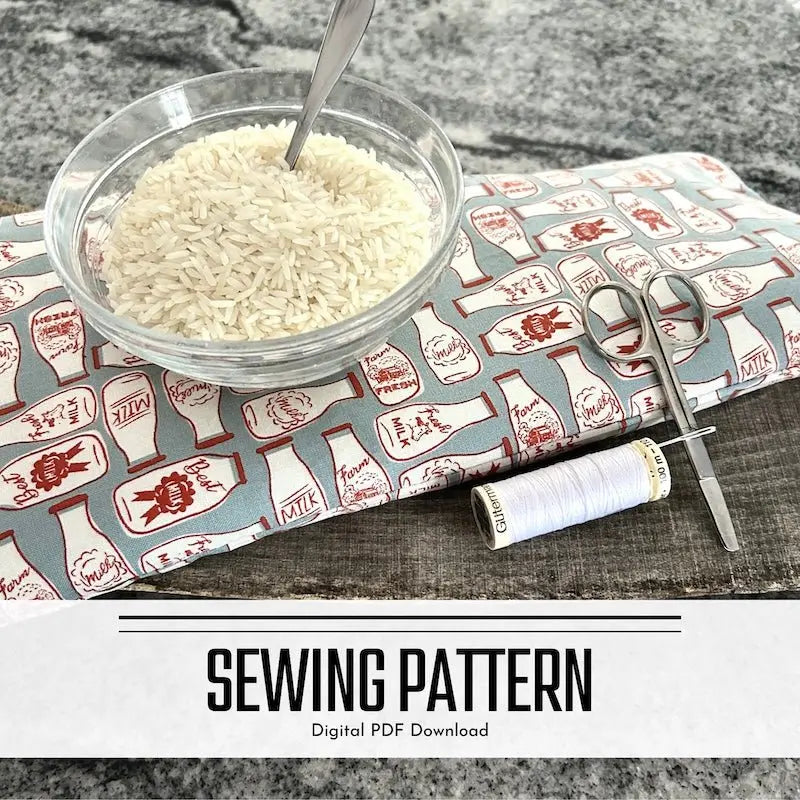 A digital PDF sewing pattern for a rice bag heating pad. The rice bag is sitting on a wooden board on a counter.