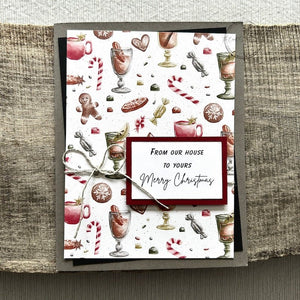 A finished card, from this DIY card kit, sitting on a wooden board.  - The Craft Shoppe Canada