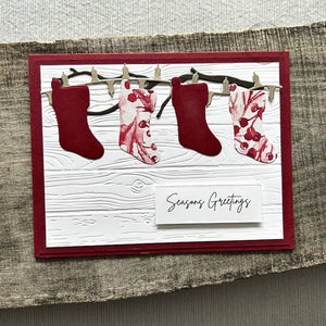 A finished card, from this DIY card kit, sitting on a wooden board.  - The Craft Shoppe Canada