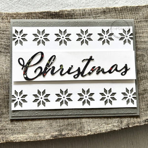 A finished card, from this DIY card kit, sitting on a wooden board.  - The Craft Shoppe Canada