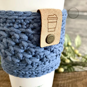 Close-up of a soft coffee sleeve made measuring 4 inches wide and 3 inches long in blue - The Craft Shoppe Canada