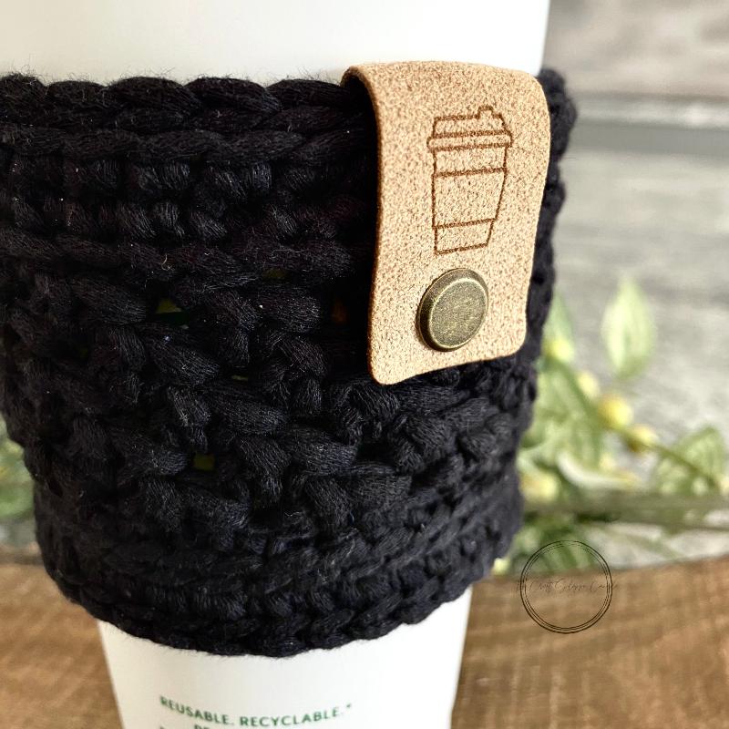 Close-up of a soft coffee sleeve made measuring 4 inches wide and 3 inches long in black - The Craft Shoppe Canada