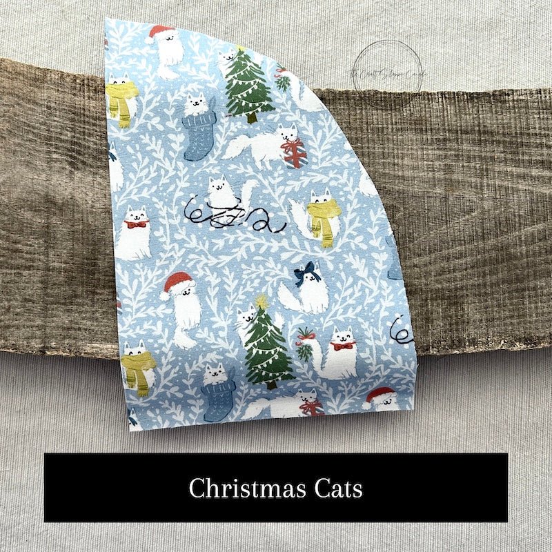 Fabric options for this DIY sewing kit featuring a Christmas cat pattern of blue and green colours - The Craft Shoppe Canada