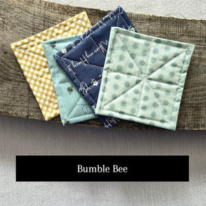 One of the fabric options for the kit. This fabric pattern shows a bumble bee fabric set - The Craft Shoppe Canada