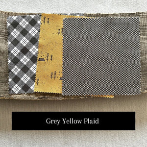 One of the fabric options for the kit. This fabric pattern shows a yellow and grey floral set - The Craft Shoppe Canada