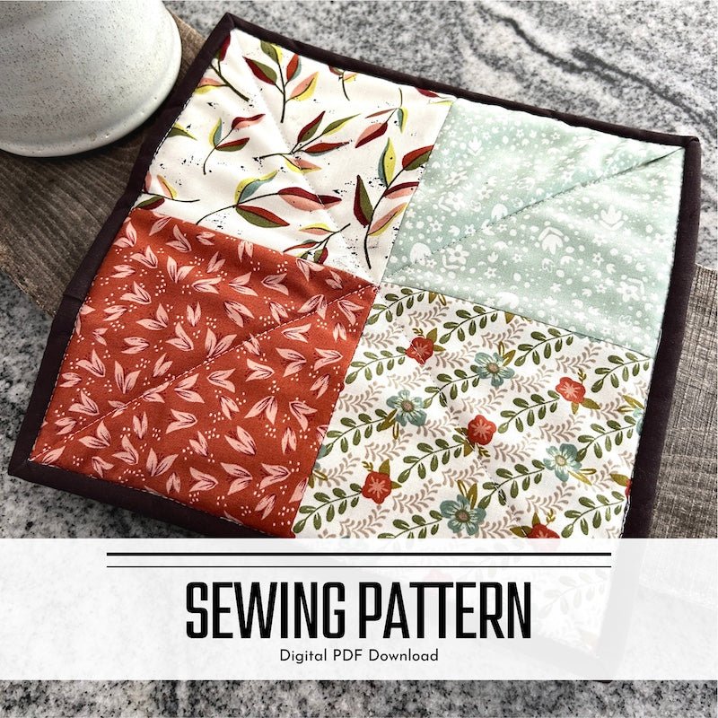 A digital sewing pattern for a trivet hot pad. The hot pad is sitting on a wooden board beside a ceramic mug.