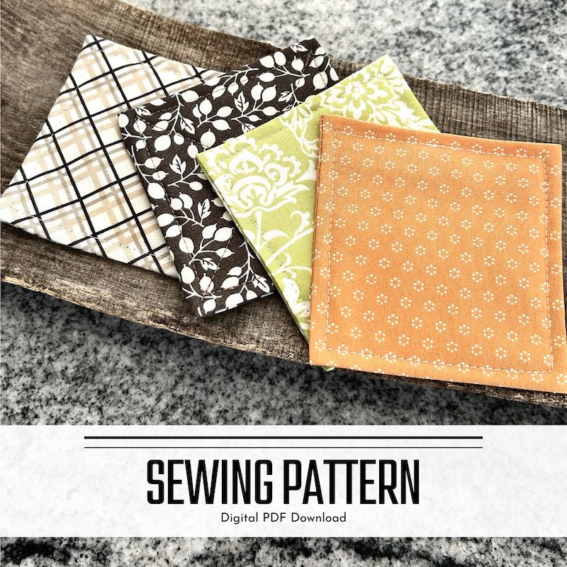 A digital sewing pattern for a quilted coaster set. The finished coaster set is laying on a wooden board - The Craft Shoppe Canada